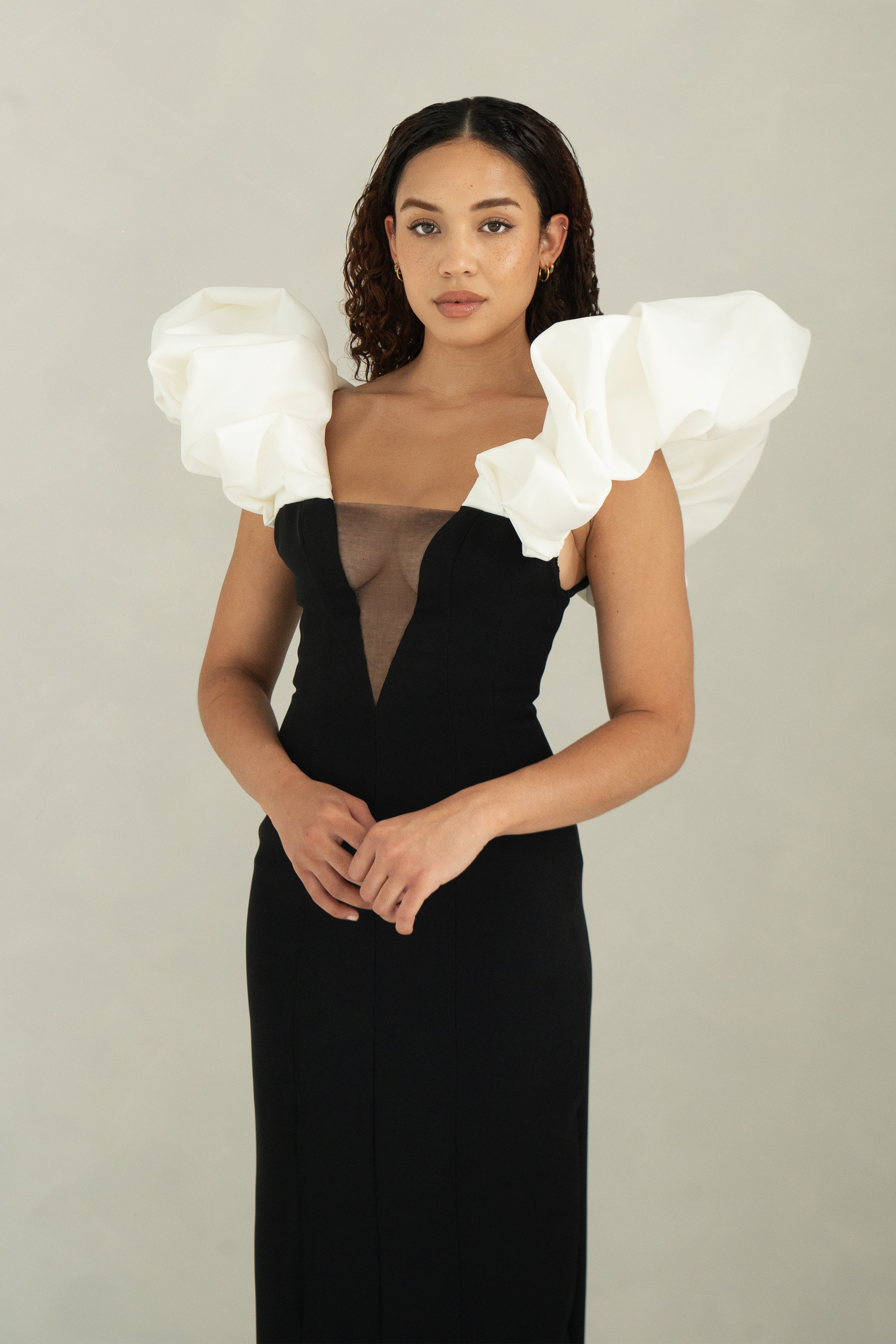 Fitted floor length evening dress with statement sleeves