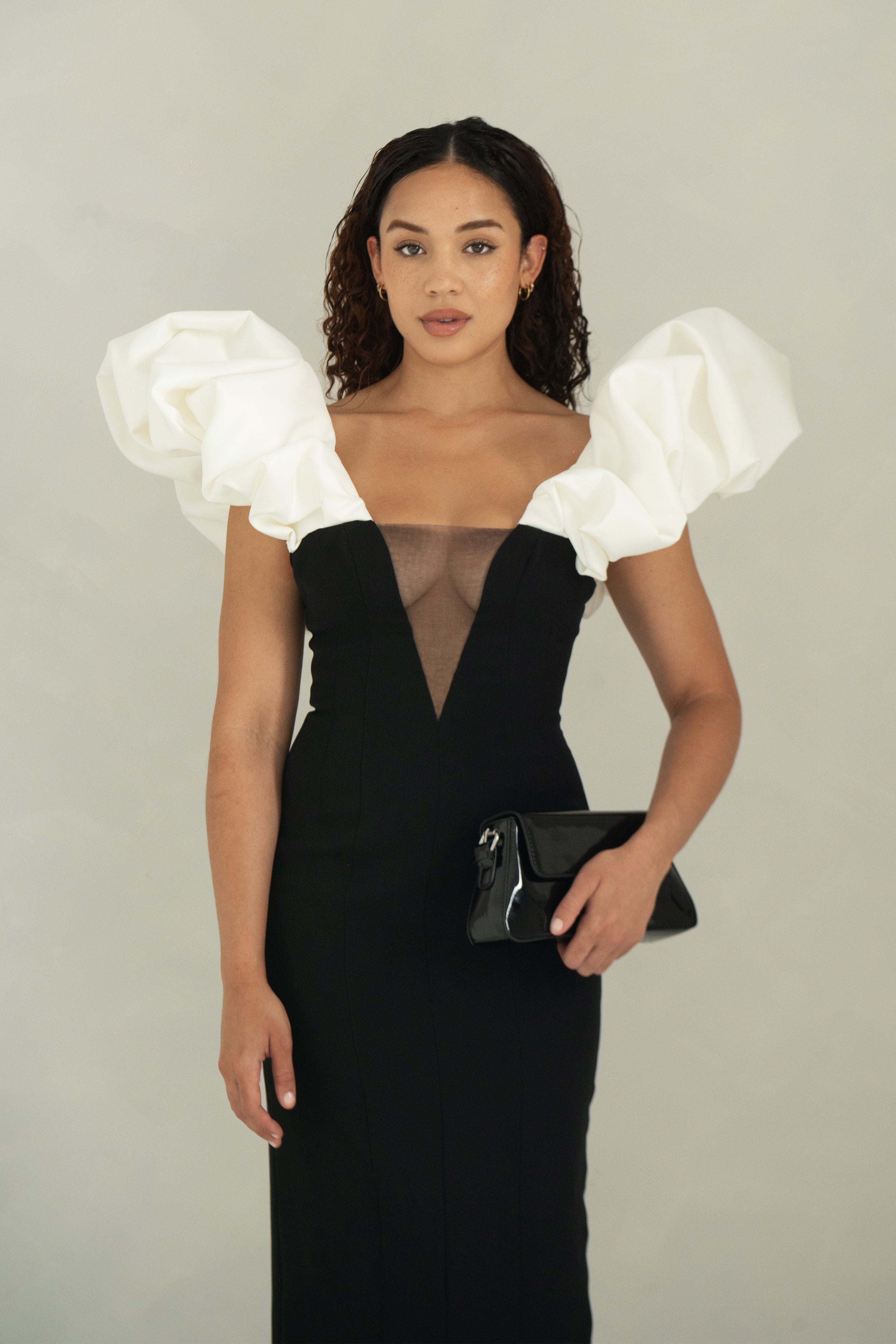 Fitted floor length evening dress with statement sleeves