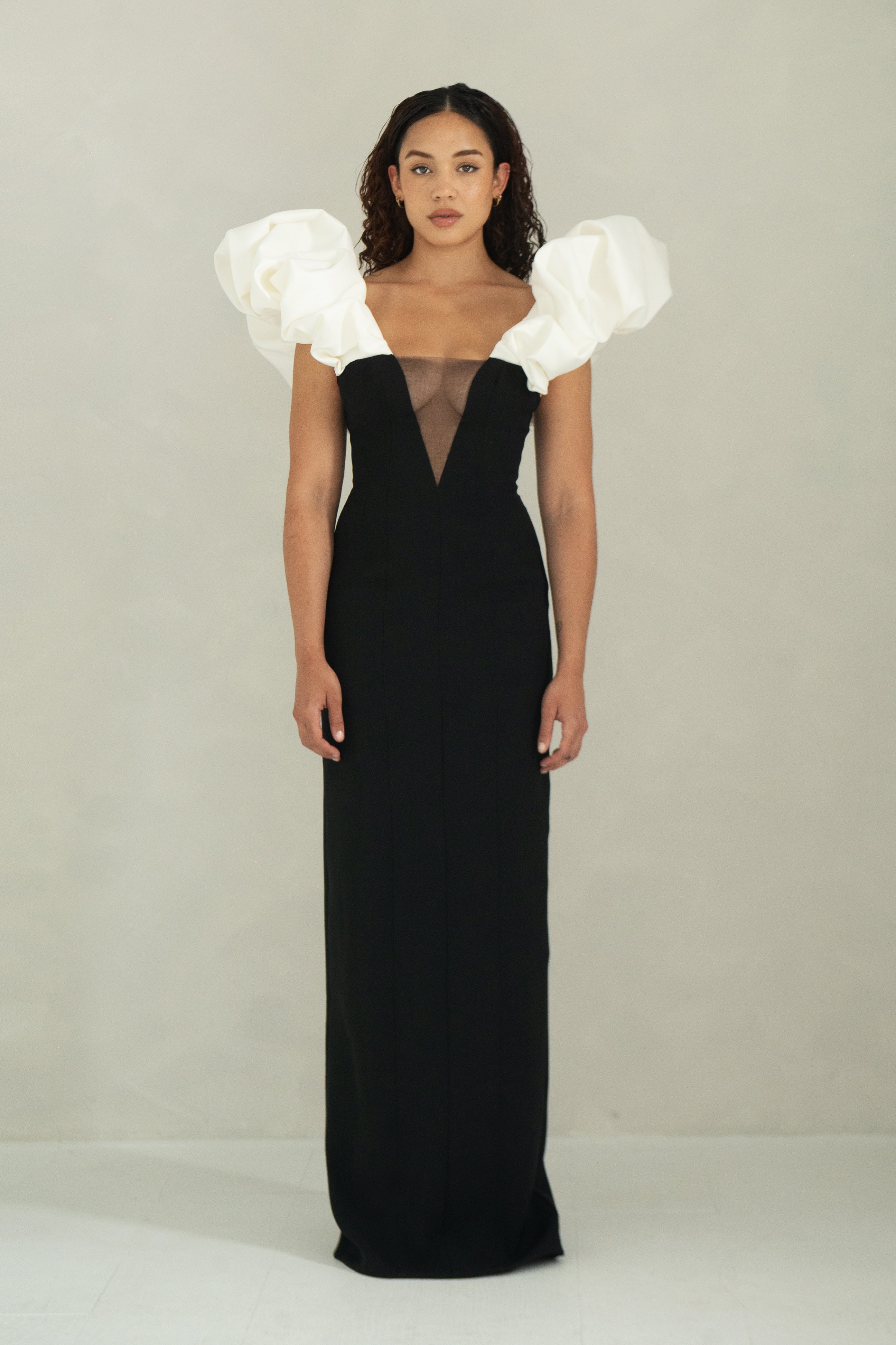 Fitted floor length evening dress with statement sleeves